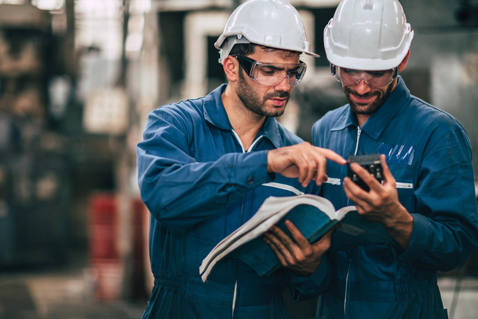 two workers discussing gauge-calibration